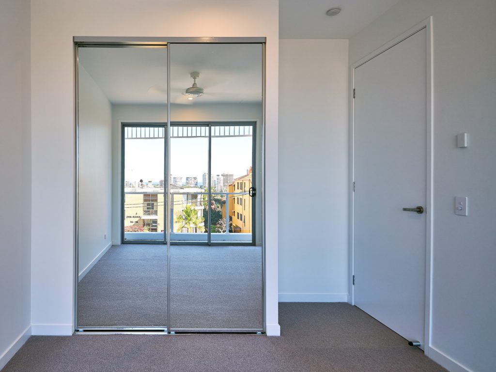 mirrored built in wardrobe